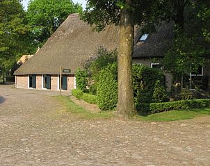 Historische uitstraling van Huisje in Orvelte, vakantiehuis in Drenthe, gelegen aan een schilderachtige straat.