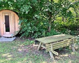 Houten sauna in de tuin van Huisje in Nieuw Balinge, vakantiehuis in Midden Drenthe.