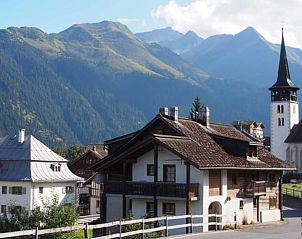 Gezellig Huisje in Vignogn, vakantieverblijf in Vignogn, Graubunden, Zwitserland, met uitzicht op majestueuze bergen.