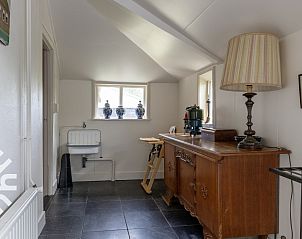 Handige wasruimte in vakantiehuis DG345 in Hoogeveen, Zuidwest Drenthe, met wasmachine en droger.