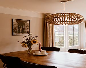 Cozy dining area in Holiday Home Comfortable 8 in Bant, Flevoland with attractive details.