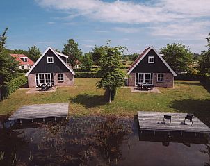 Aerial view of Holiday Home Comfortable 8 in Bant, Flevoland with surrounding nature.