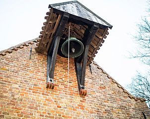 Historische kloktoren van Huisje in Jannum, vakantiehuis in Friesland.