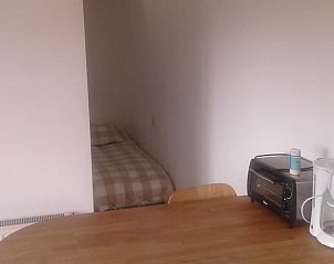 Slaaphoek in Vakantiehuisje in De Steeg, Veluwe, met gezellige uitstraling.