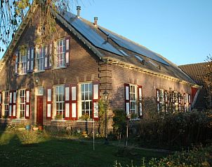 Gezellige tuin bij Vakantiehuis in De Steeg, Veluwe, Gelderland.