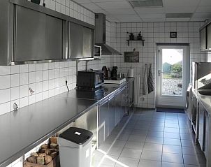 Spacious kitchen in vacation home Hoog Soeren, Veluwe, with plenty of workspace.