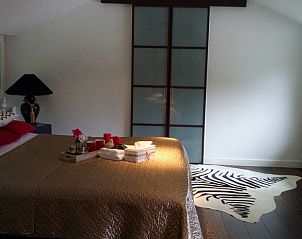 Ruime slaapkamer in Veluwse Logeerboerderij vakantiehuis, Laag Soeren, met luxe inrichting op de Veluwe.