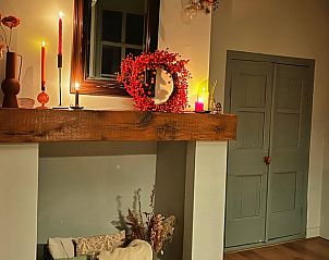 Gezellige open haard in Huisje in Rozendaal, vakantiehuis op de Veluwe.