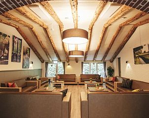 Comfortabele lounge in De Schaapskooi vakantiehuis in Hoogeloon met gezellige zitplaatsen, Kempen, Noord Brabant.