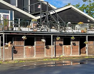 Huisje in Kwadijk, ein Ferienhaus in Nordholland, bietet eine schne Terrasse mit Blick auf die lndliche Umgebung der IJsselmeerkste.