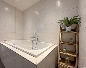 Stijlvol ligbad in Waddenhuis, Westerland, perfect om te ontspannen na een dag aan de Waddenkust.