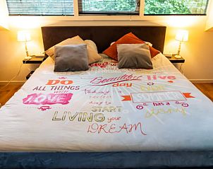 Slaapkamer met stapelbed in vakantiehuis in Vroomshoop, Twente, ideaal voor kinderen.