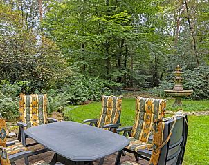 Decorative fountain in the garden of Holiday Home in Bornerbroek, Twente, Overijssel.
