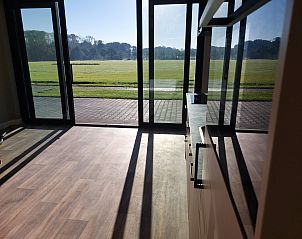 Adembenemende zonsopgang bij OV657 vakantiehuis in Hertme, Twente met kleurrijke lucht.