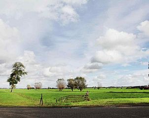 Luchtfoto van vakantiehuis OV114 in Kamperveen, omringd door natuur in Overijssel