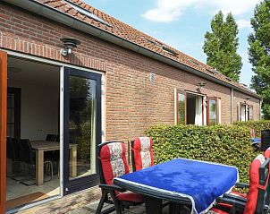 Comfortable outdoor area of VZ526 Group accommodation Kattendijke in Zeeland.
