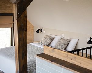 Knusse slaapkamer in Huisje in Bodegraven, bed and breakfast in het Groene Hart, perfect voor een ontspannen verblijf.