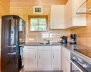 Moderne keuken in Vakantiehuisje in Ameide met alle gemakken voor een aangenaam verblijf.