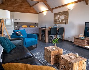Gezellige woonkamer van Vakantiehuisje in Zuidland, Voorne Putten, Zuid-Holland.